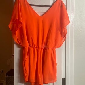 Beautiful vibrant orange GB romper